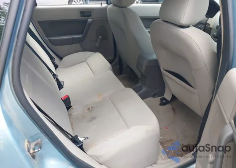 2009 Ford Focus S из США, поврежденный, VIN 1FAHP34NX9W107045